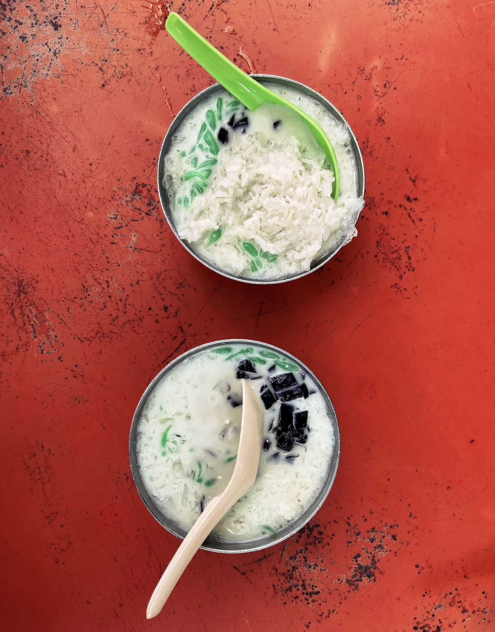 Chendol dessert with coconut milk, pandan jelly and palm sugar