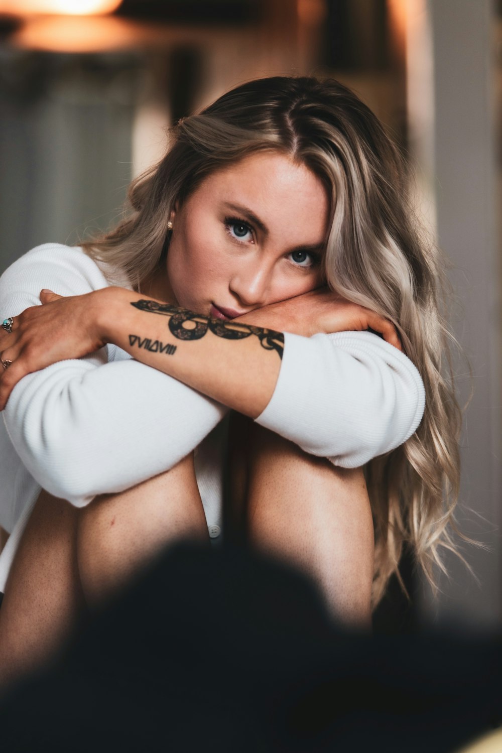 woman in white long sleeve shirt