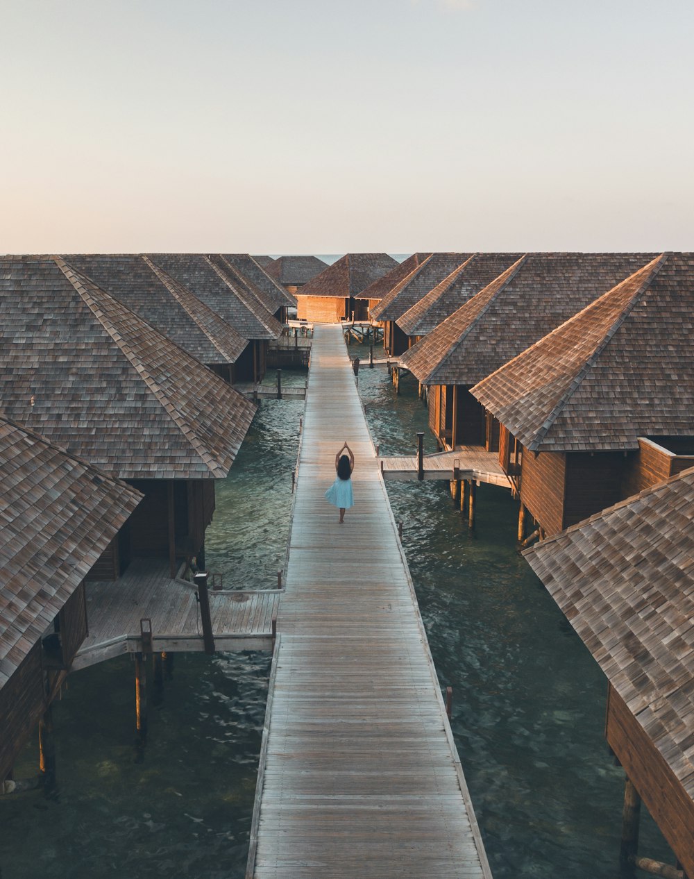 people walking on wooden dock during daytime