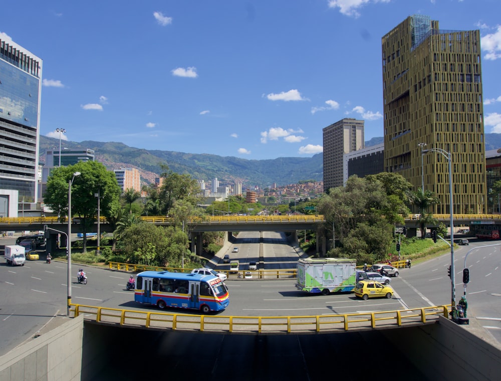 cars on road near buildings during daytime