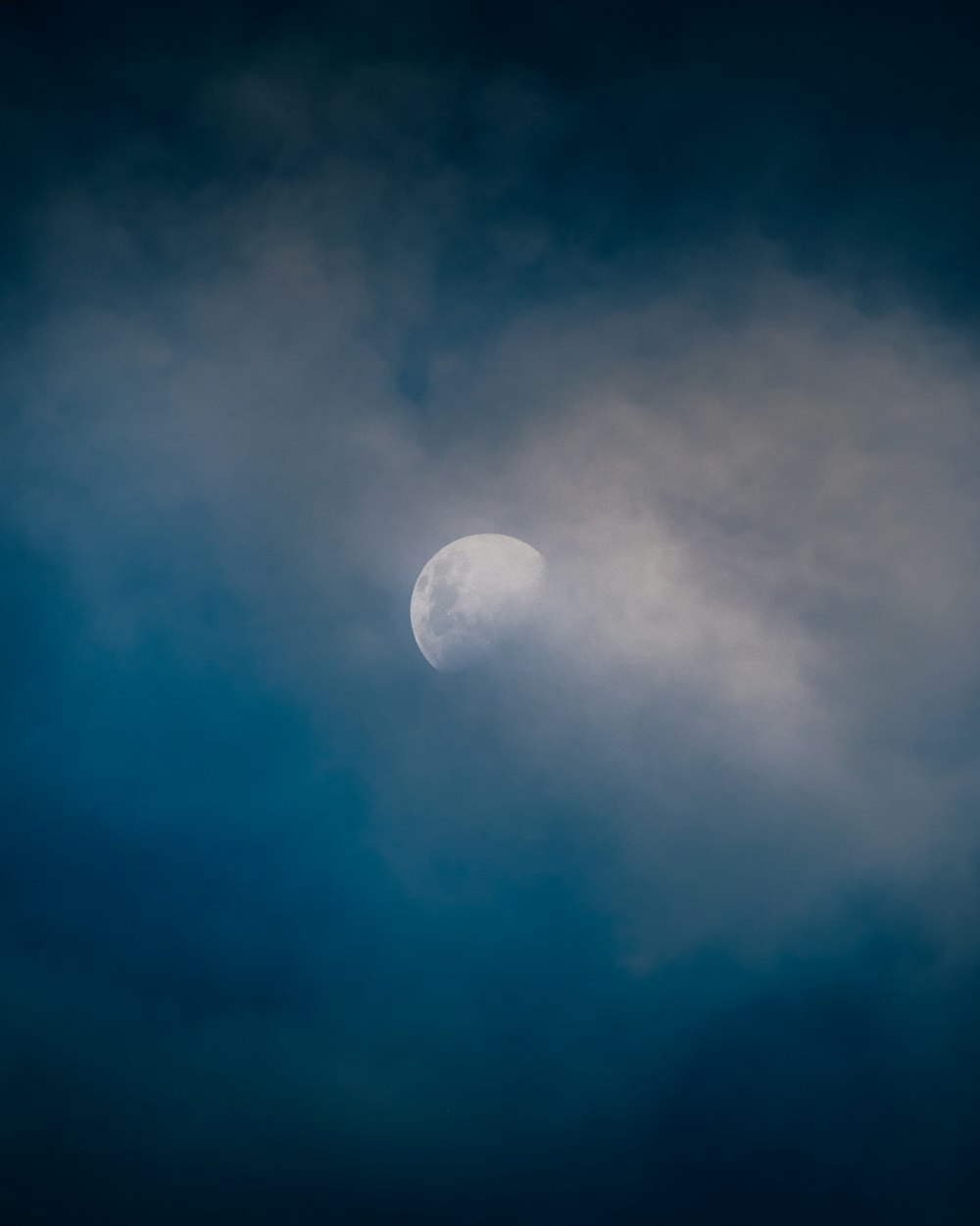 full moon in blue sky