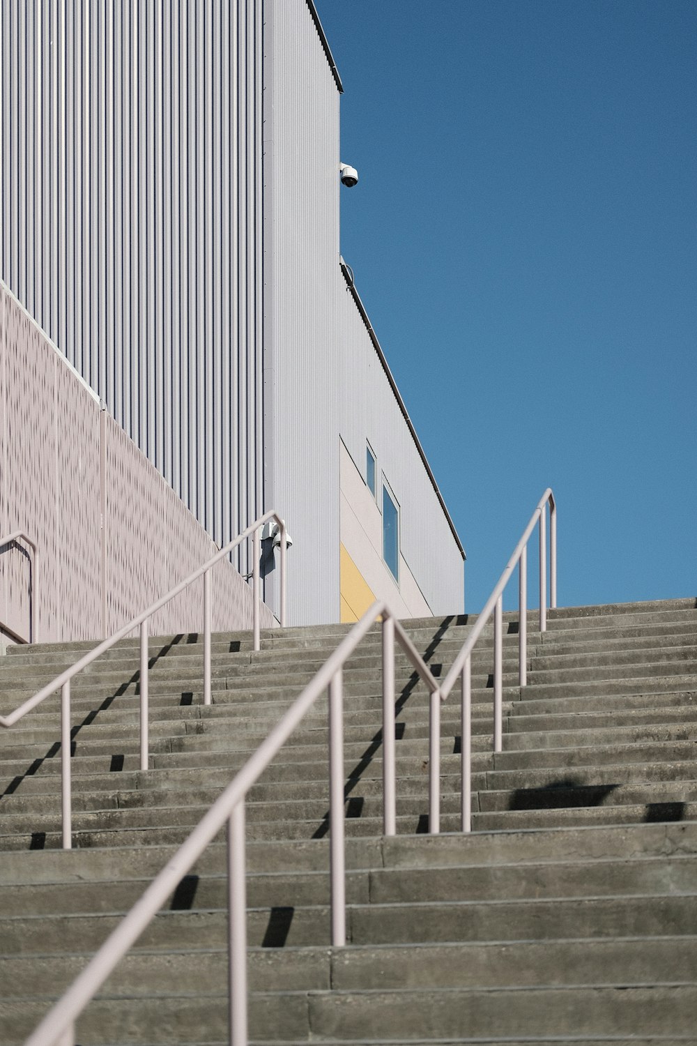 white concrete building under blue sky during daytime