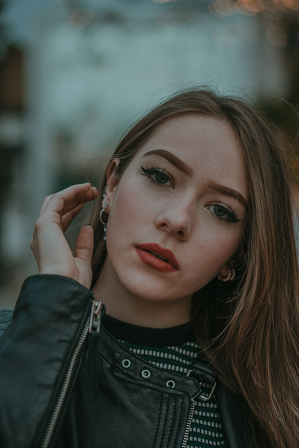 woman in black leather jacket