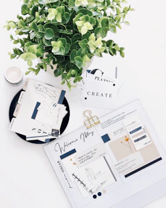 white printer paper on white table