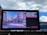 A large billboard displays a public service announcement addressing domestic abuse, featuring an image of a city street lined with historic buildings. The text on the billboard reads: 'Domestic abusers are no longer walking among us. They’re locked inside with their families.'