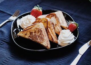 bread on black ceramic plate