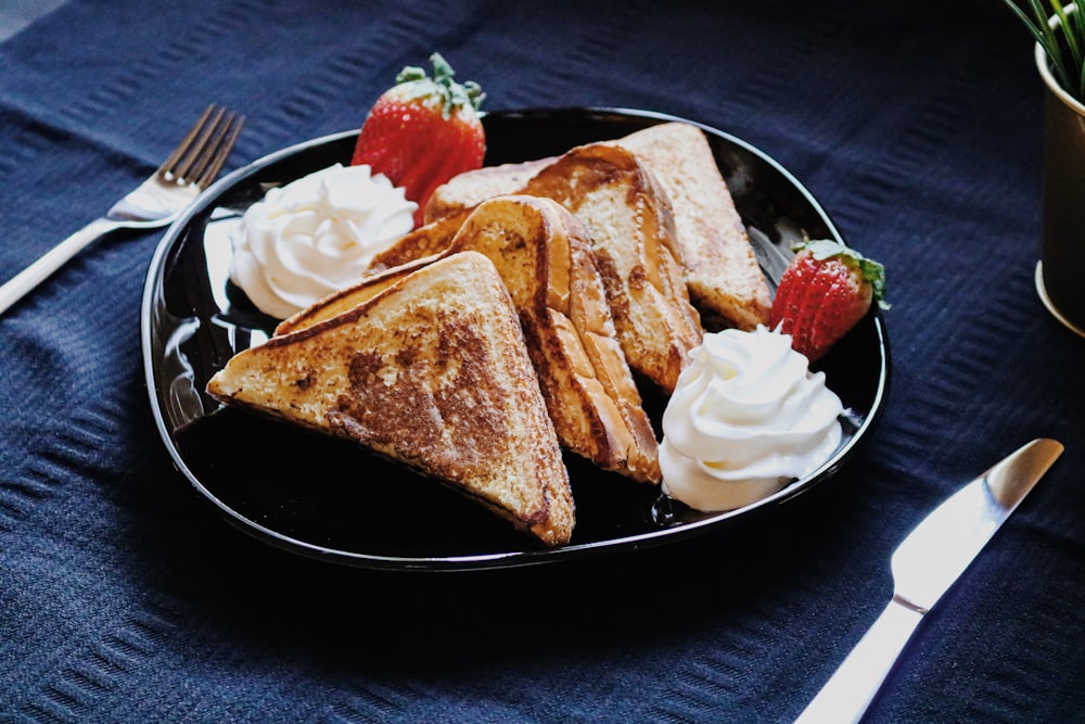 bread on black ceramic plate