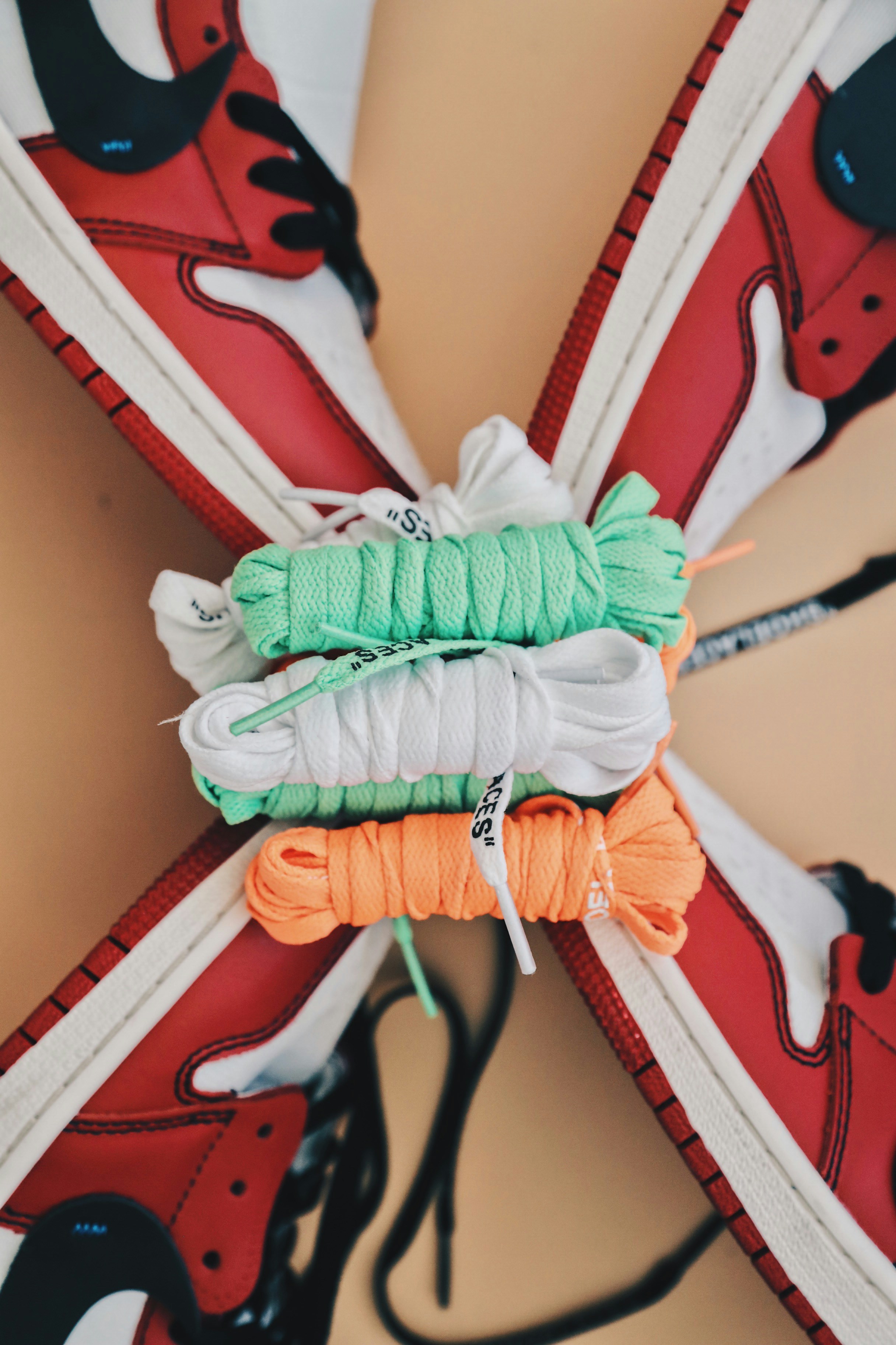 half red half white nike shoes