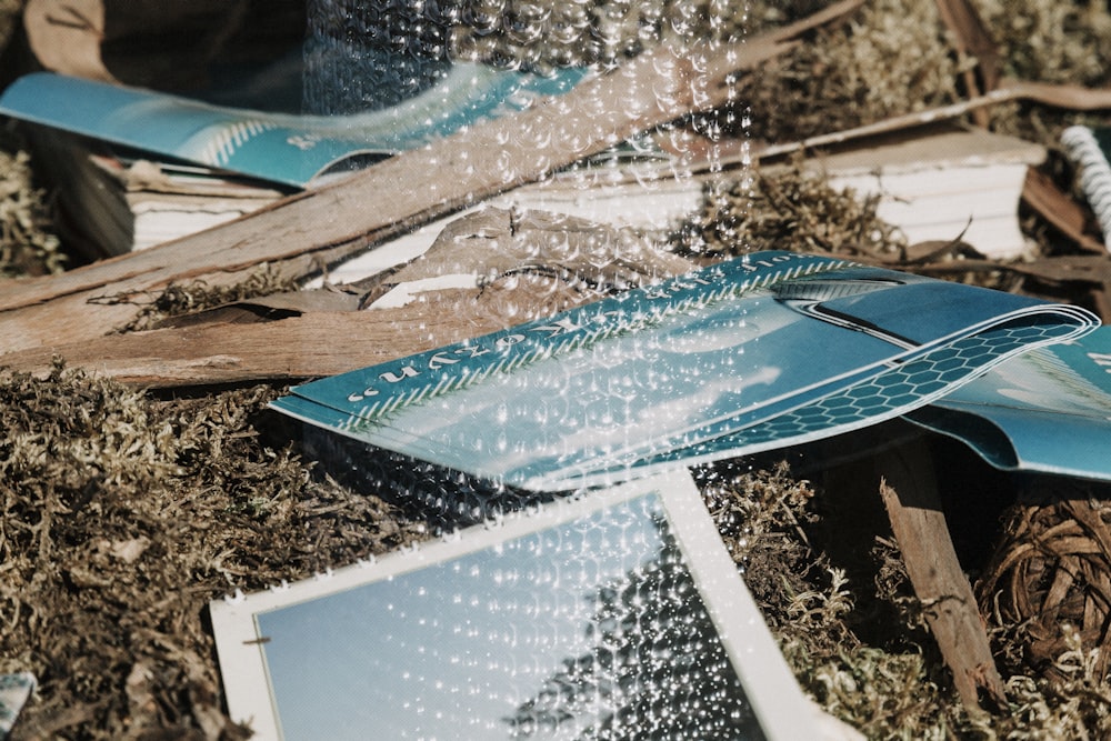 white and blue net on brown wooden table