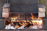 An outdoor cooking setup featuring our charcoal briquettes.
