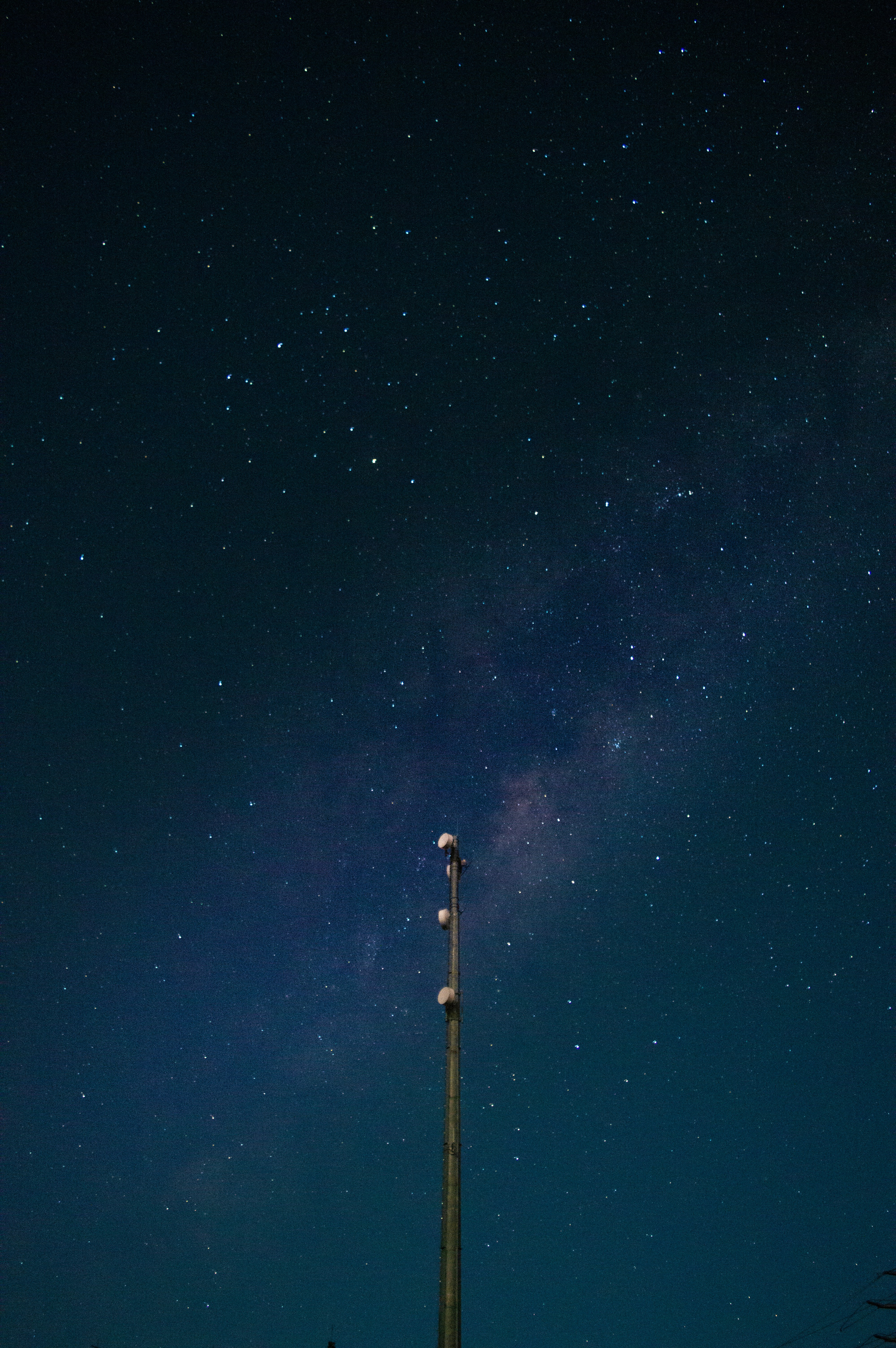 black and white tower under starry night
