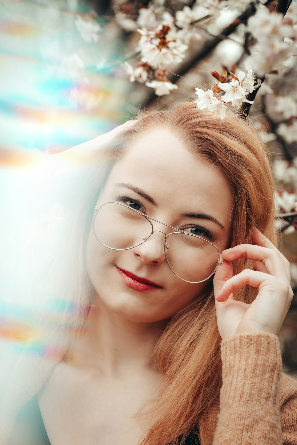 woman wearing silver framed eyeglasses