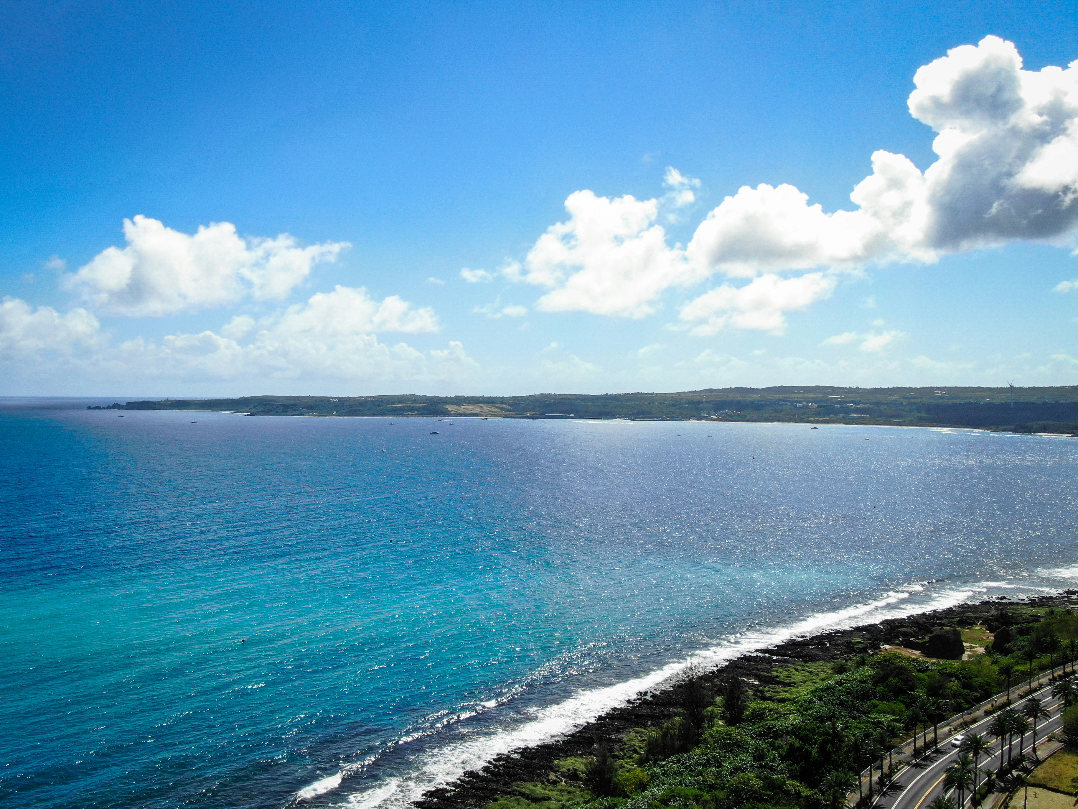 blue sea under blue sky during daytime