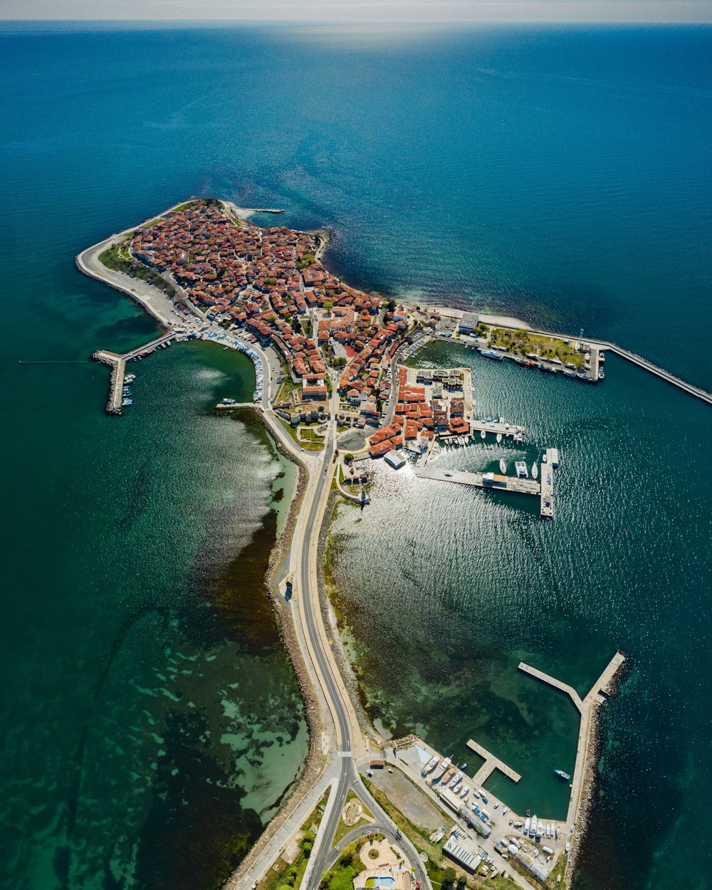 aerial view of green and white island during daytime