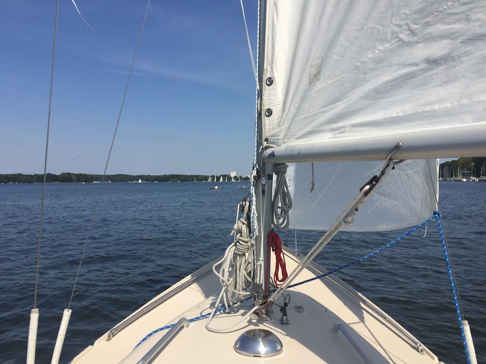 white sailboat on sea during daytime