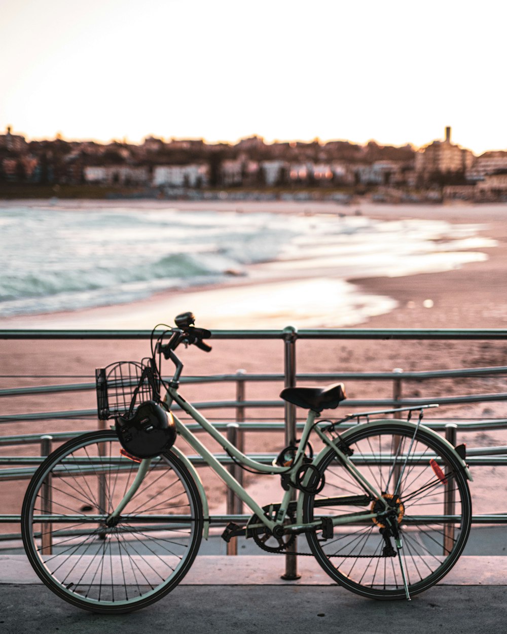 black city bike on beach during daytime