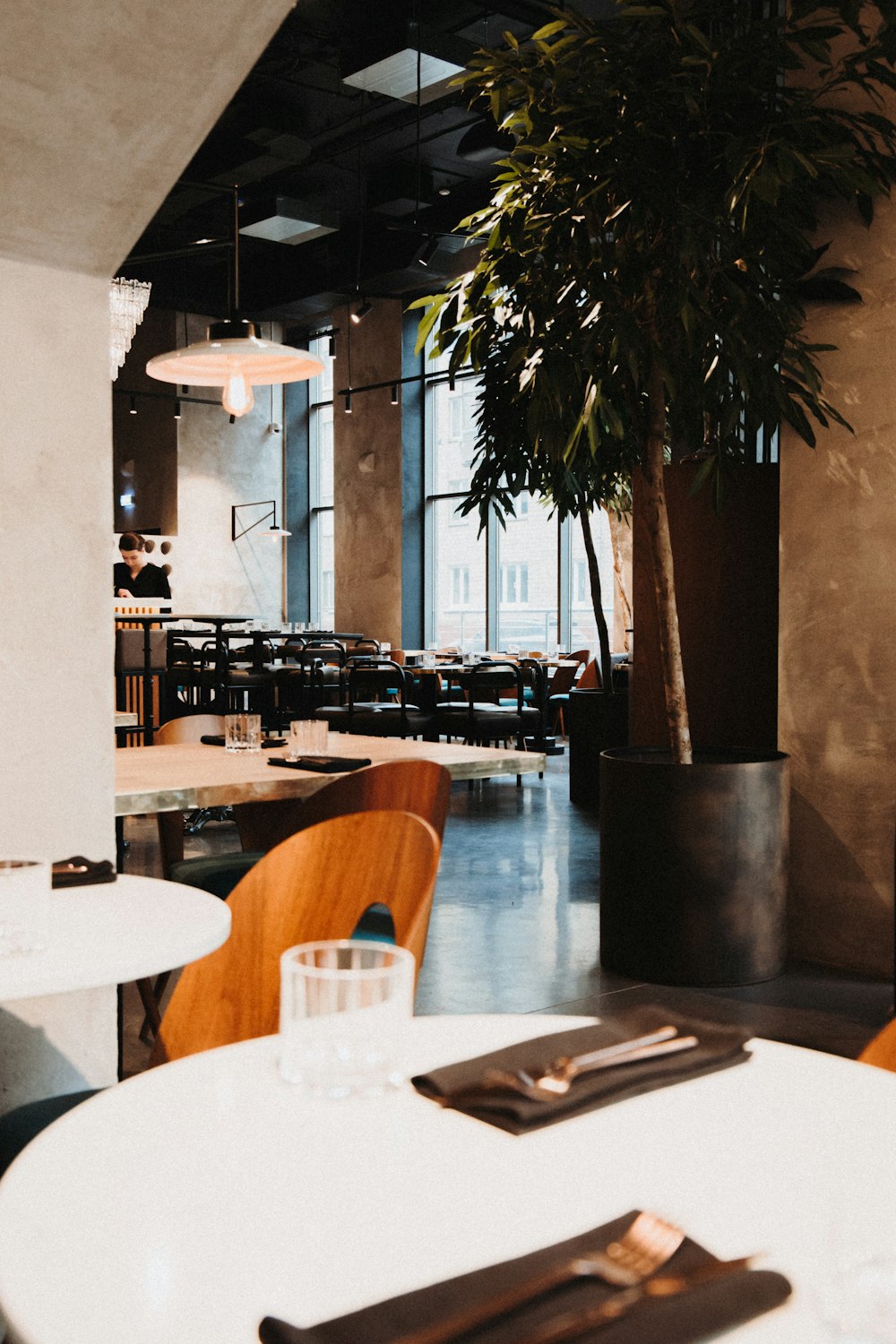 brown wooden table with chairs