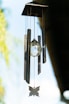 clear glass hanging ball on black metal rack
