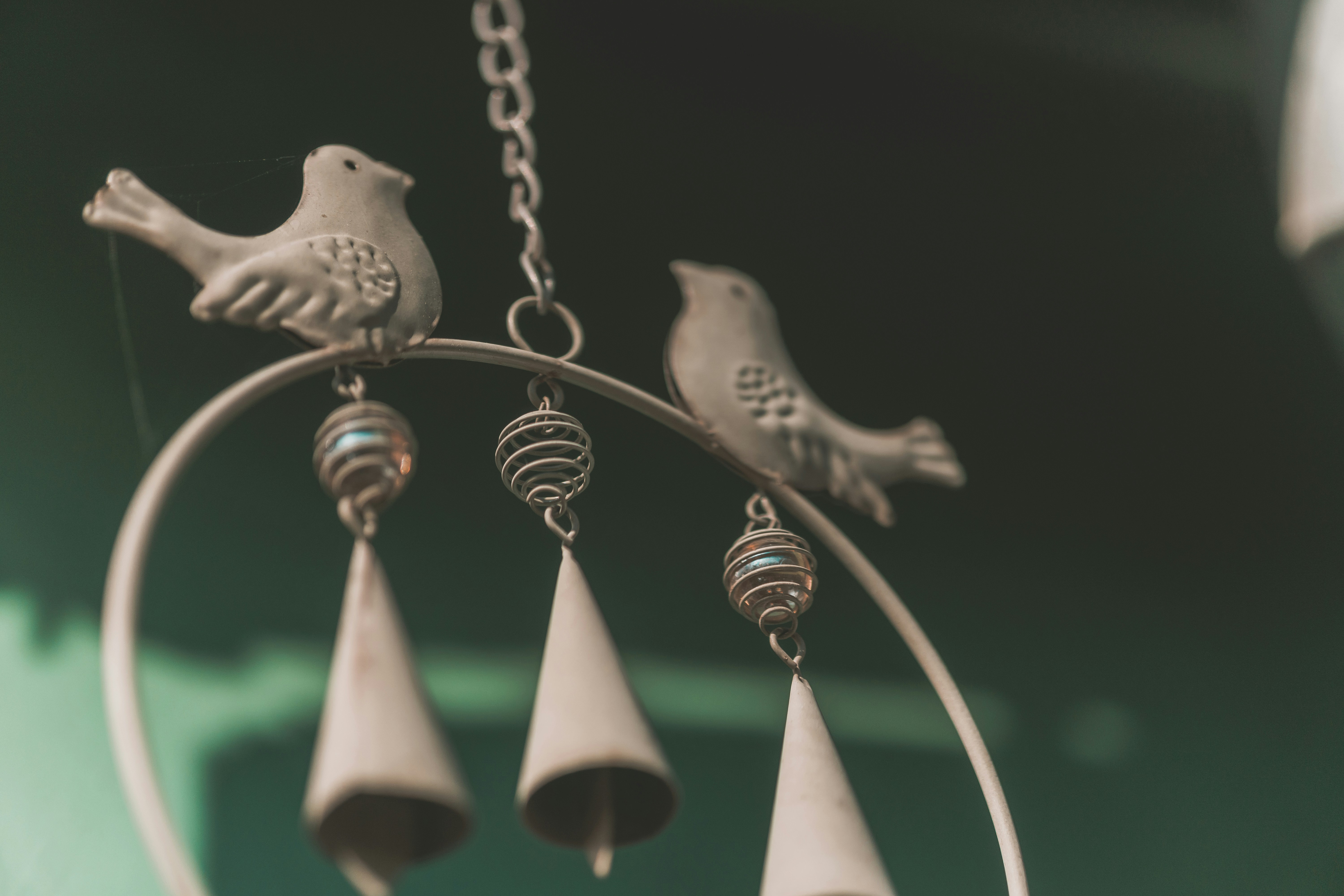 brass bell with white string lights