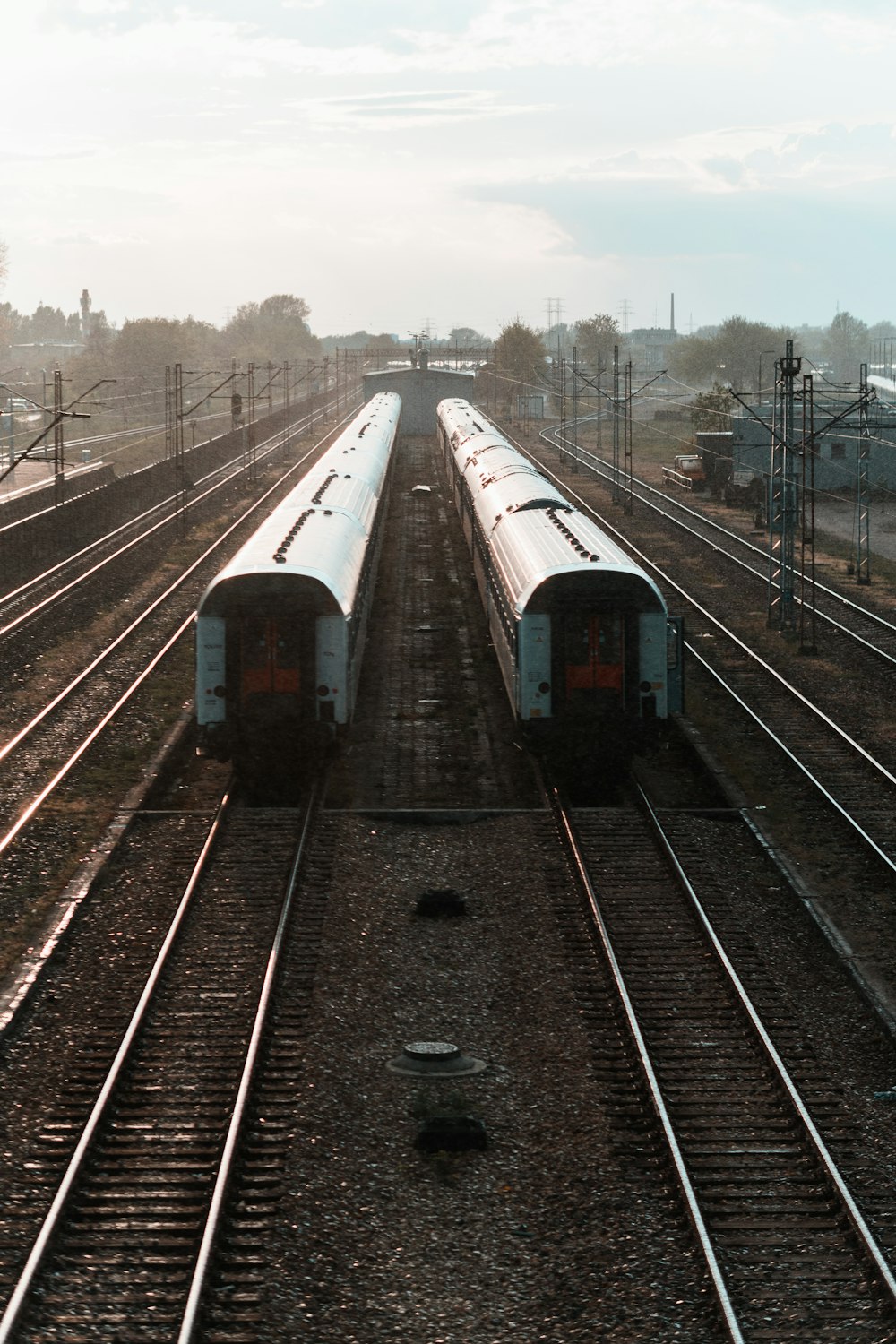 green train on rail during daytime