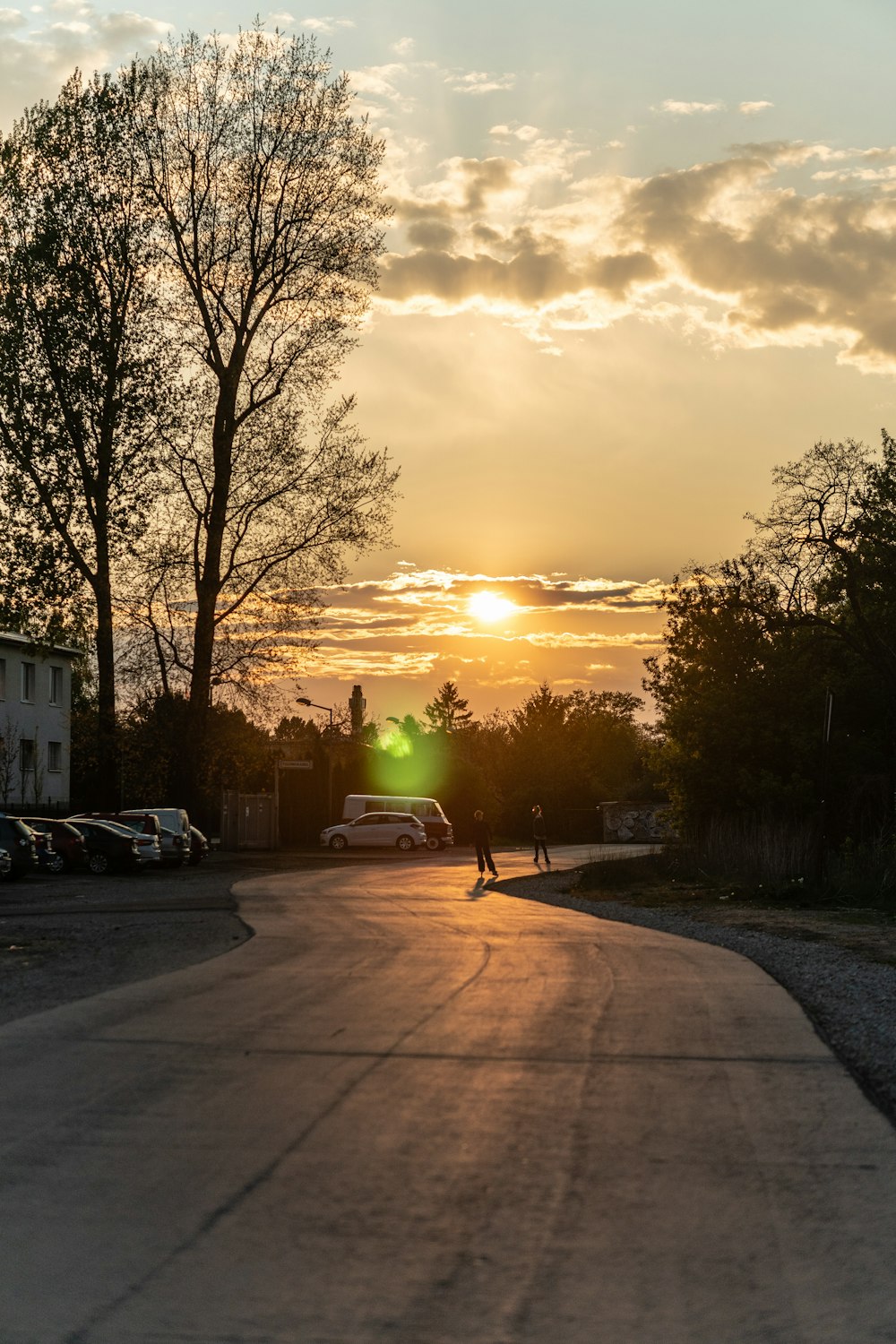 cars parked on parking lot during sunset