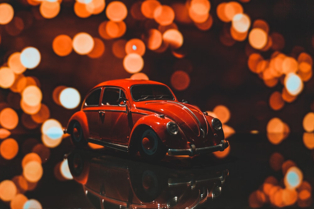 black volkswagen beetle on road during night time