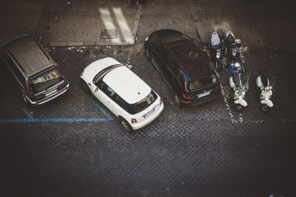 black and white car on road