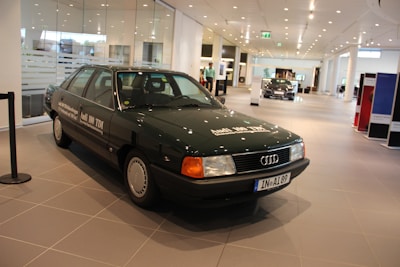 An assortment of Audi spare parts displayed neatly.