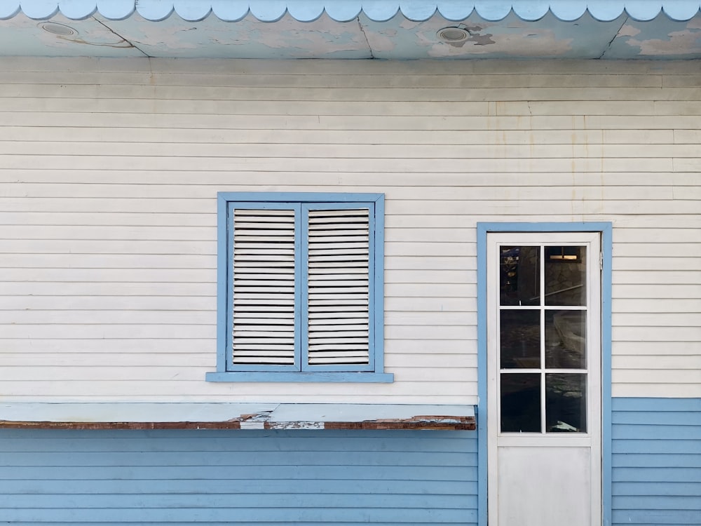 white wooden framed glass window closed