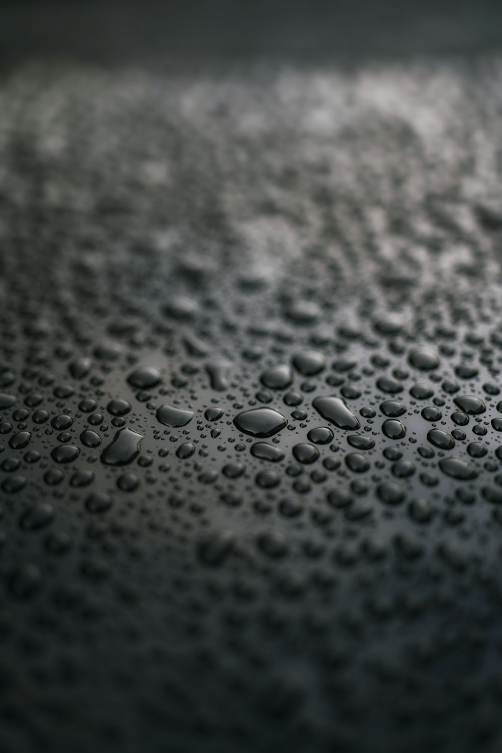 water droplets on black surface