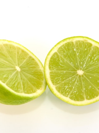 sliced lemon on white background