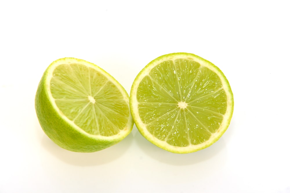 sliced lemon on white background