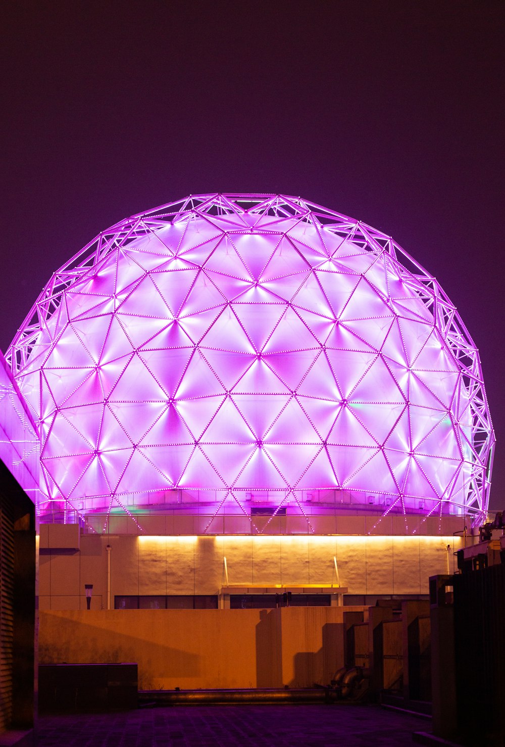 blue glass dome building during nighttime