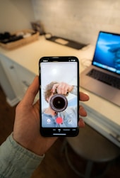 person holding black android smartphone