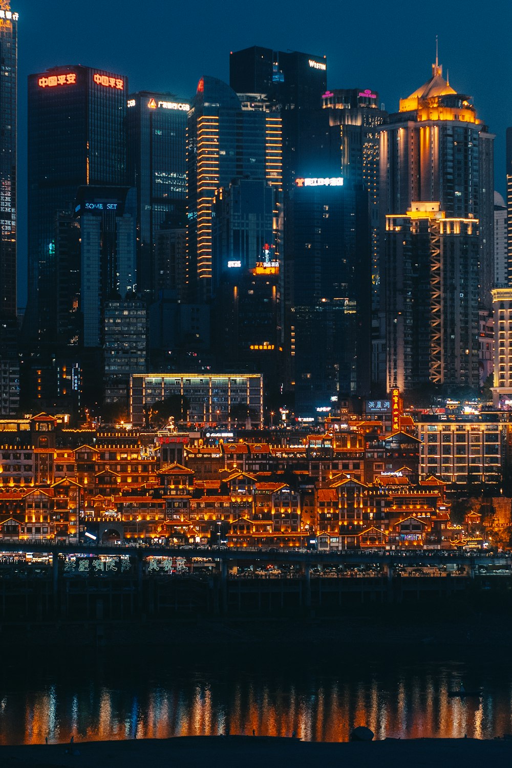 city skyline during night time