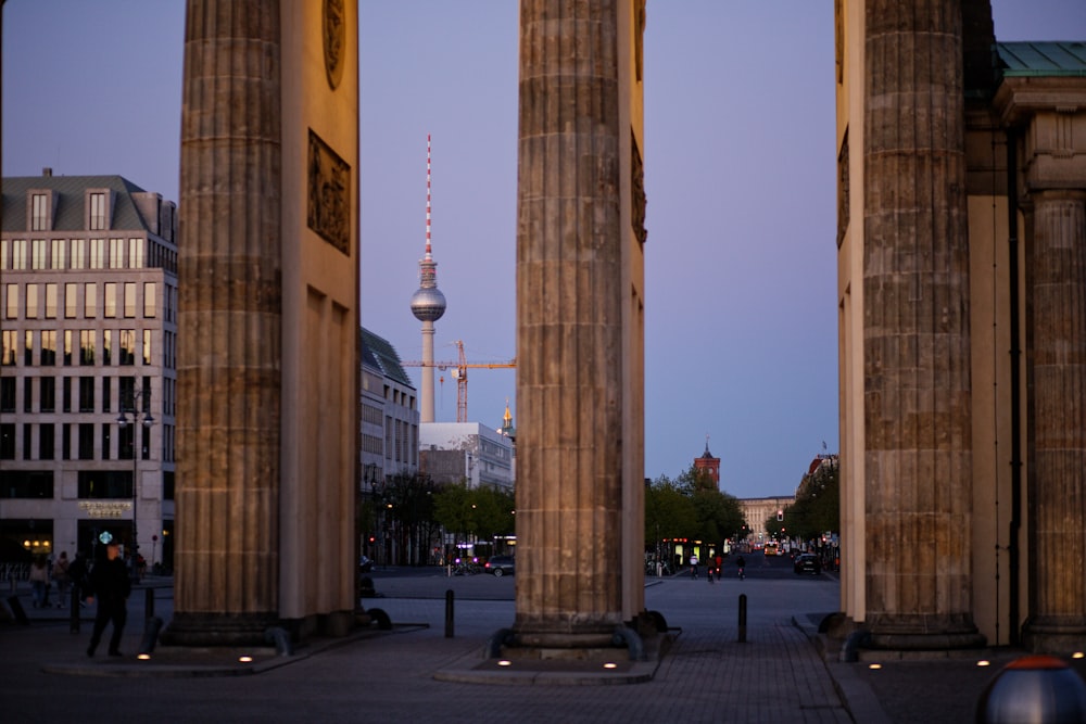 a group of pillars sitting in the middle of a street