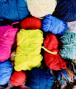 A colorful array of chunky yarns for knitting.