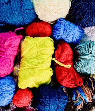 A colorful array of chunky yarns for knitting.