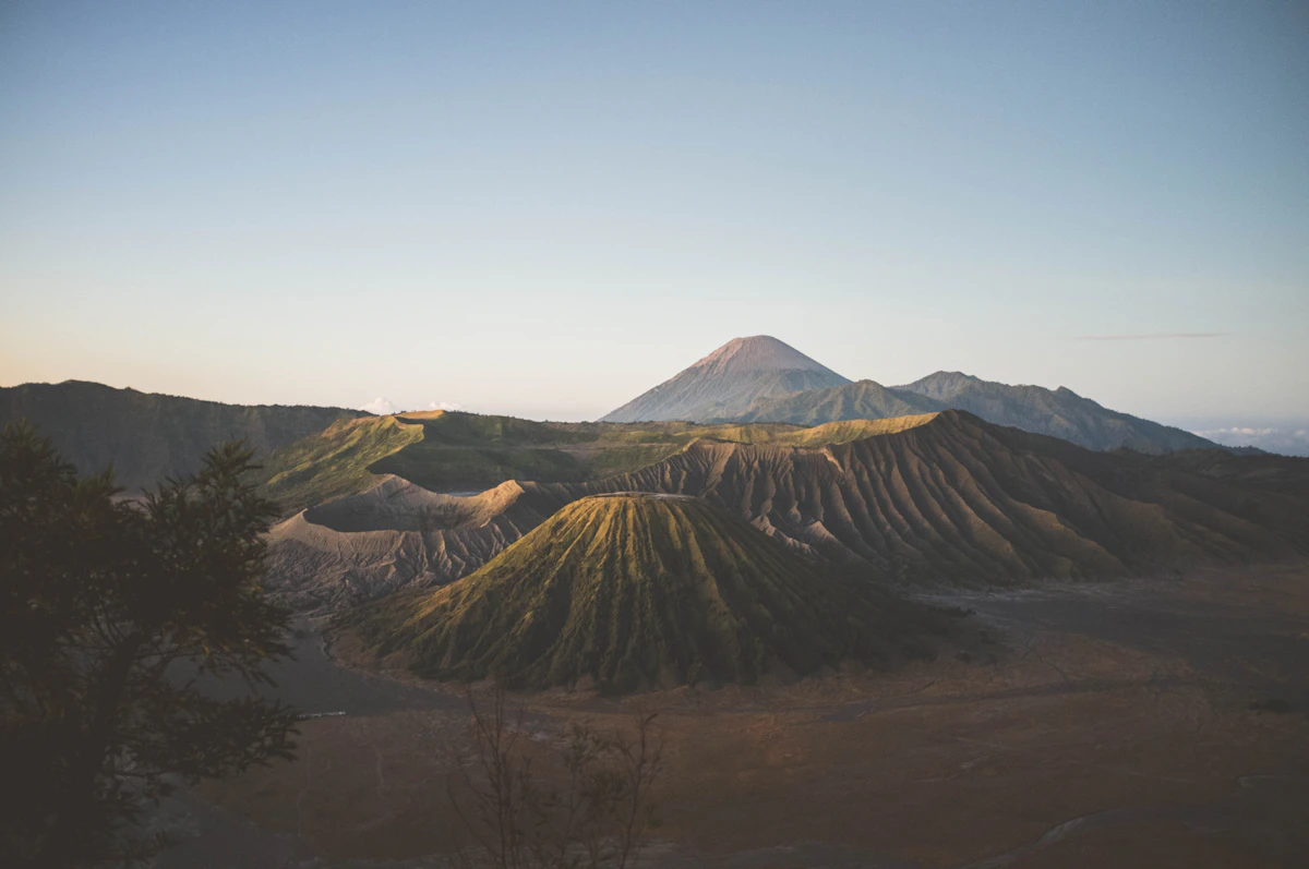 Active volcanic caldera of Mount Bromo rising above the Tengger Sea of Sand