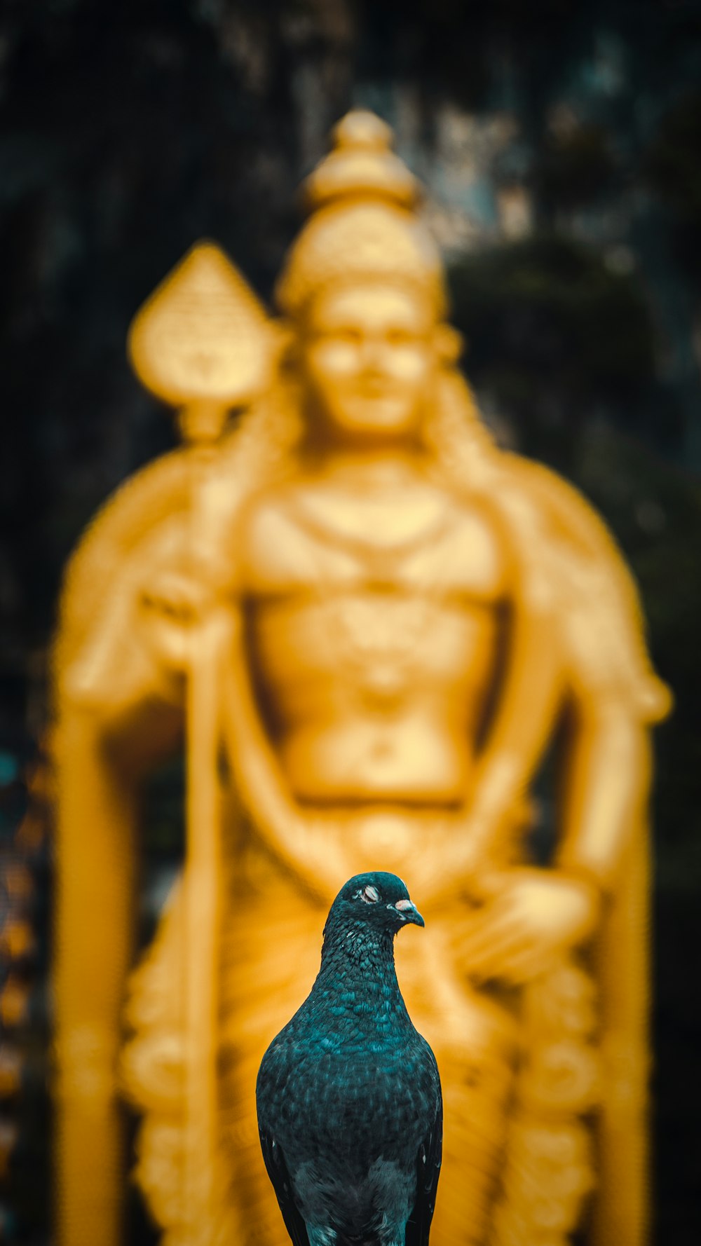 gold buddha statue during daytime