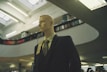 A dressed mannequin showcasing a formal outfit in a chic setting.