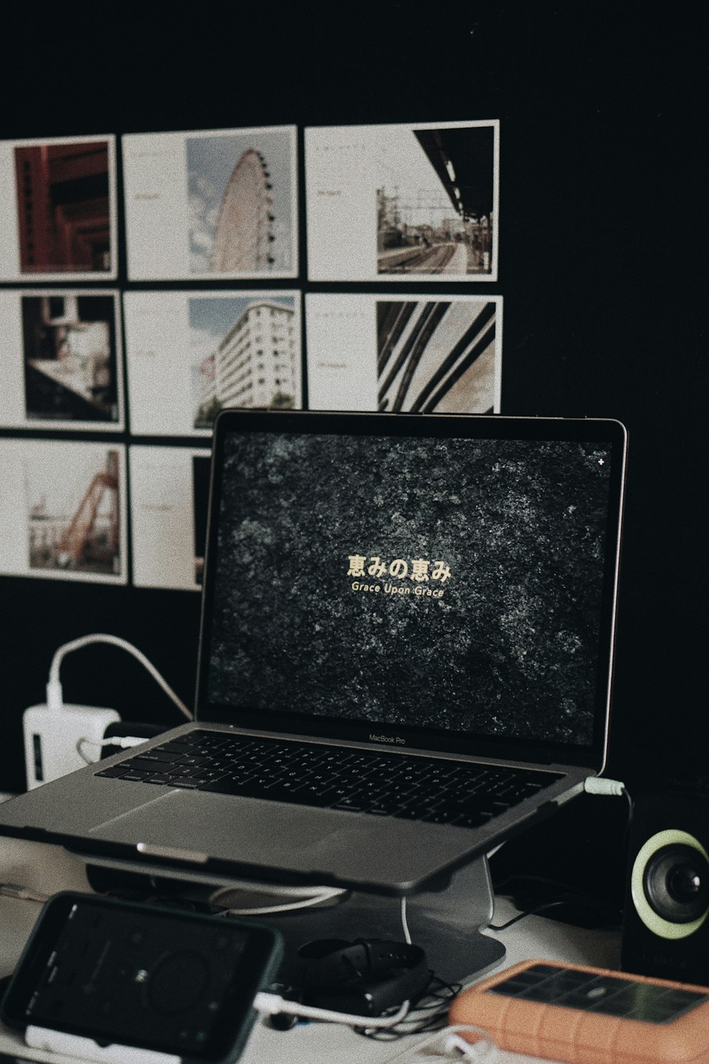 black and gray laptop computer on black table