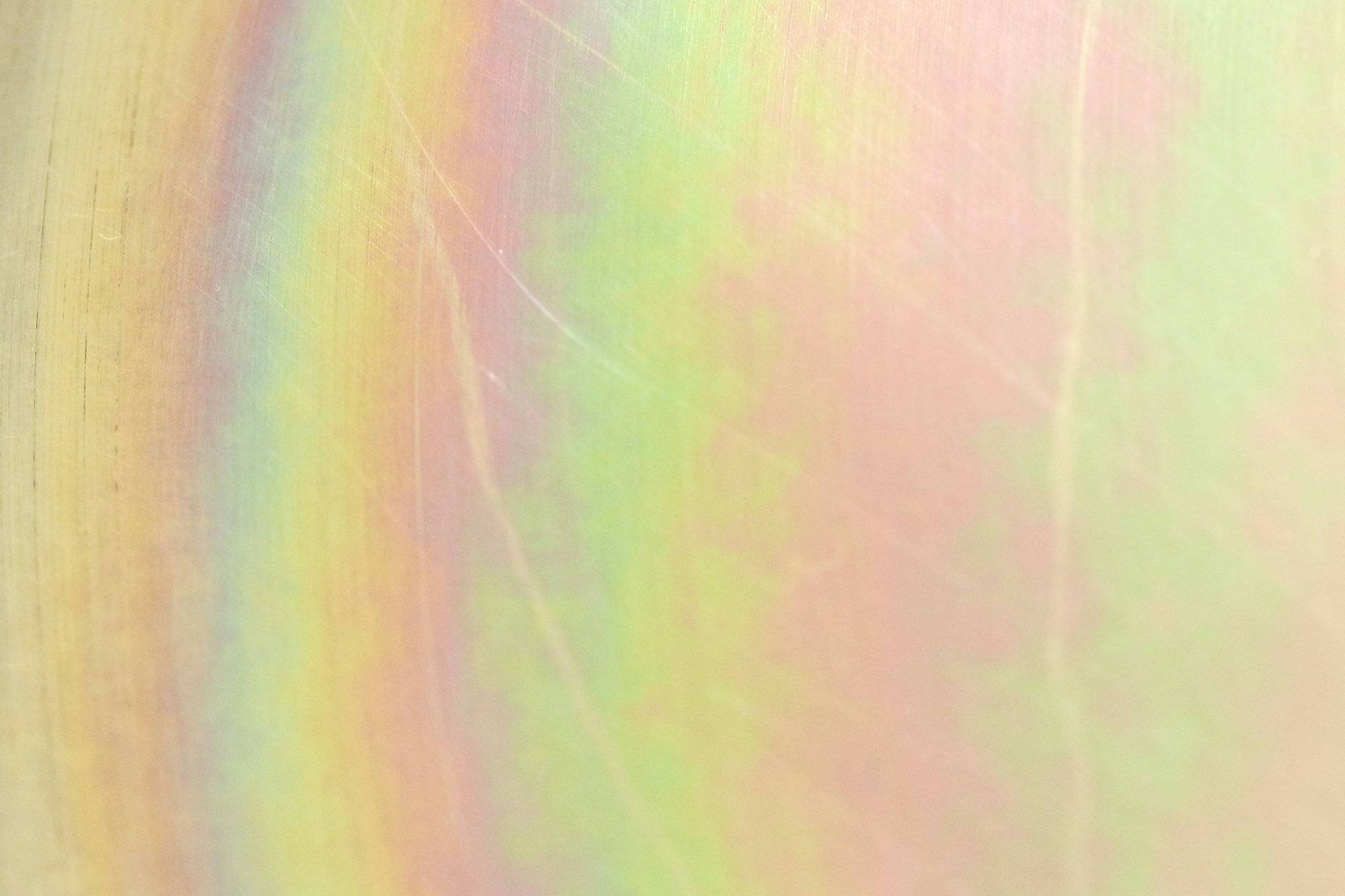 pink yellow and green textile