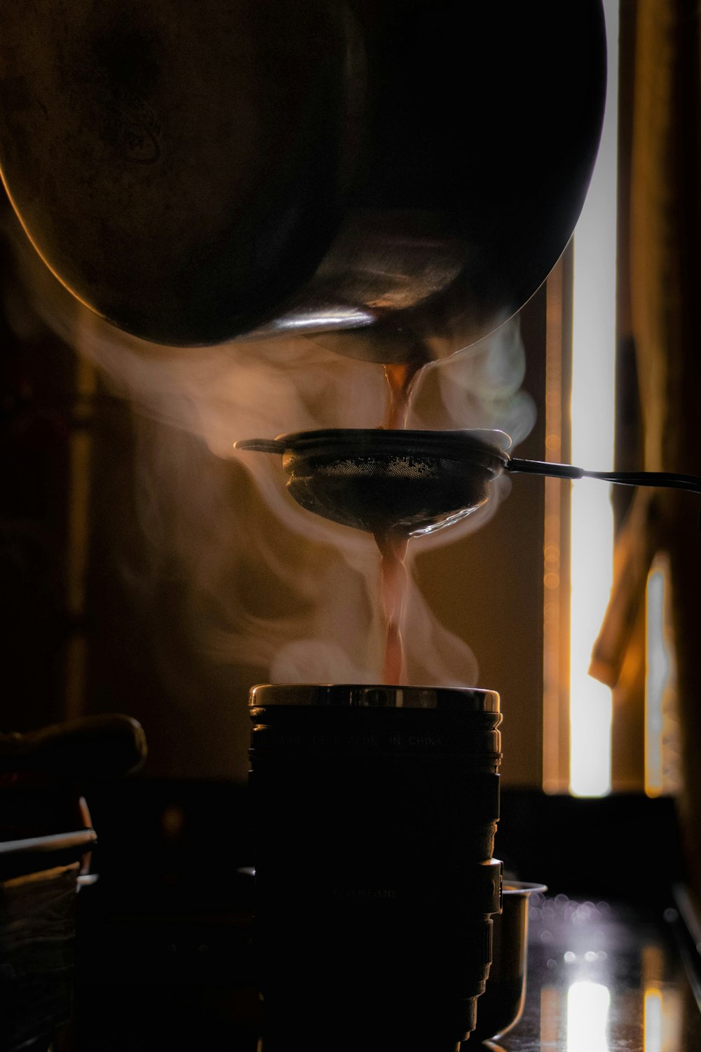 black ceramic mug with coffee