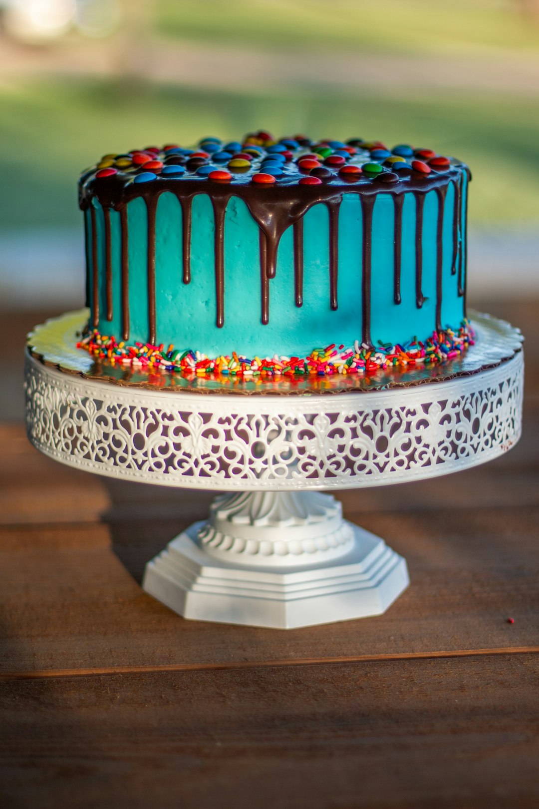 white and red cake with red icing on top