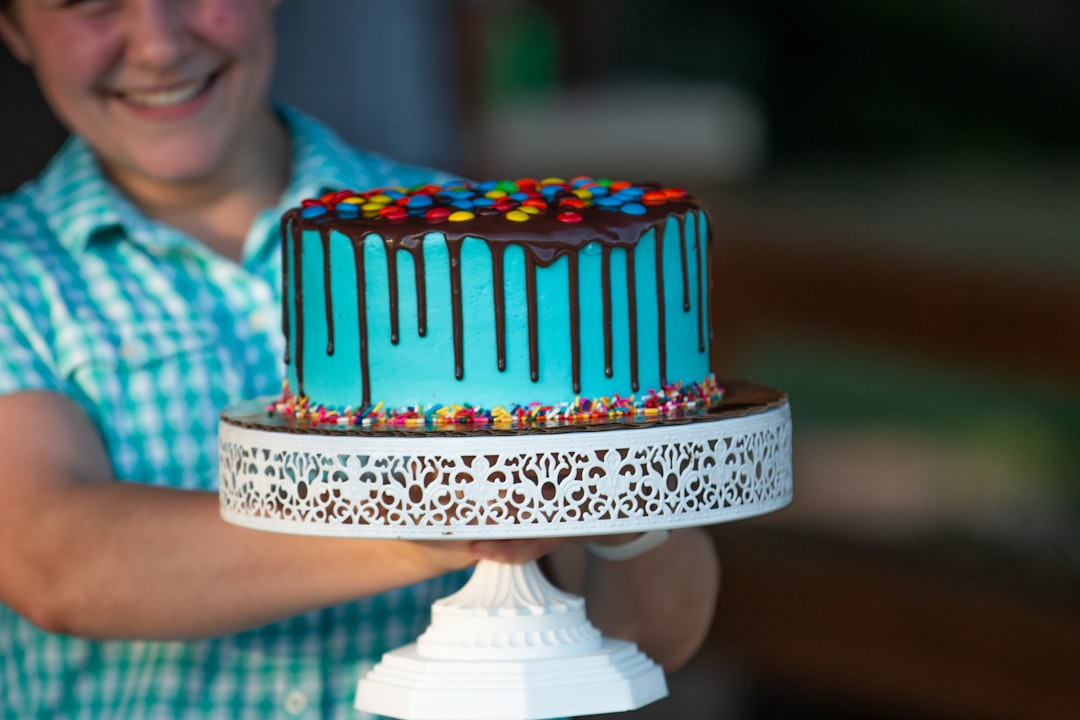 white and red cake on white cake stand