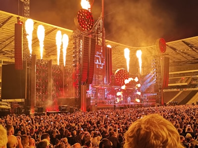 A large stadium event with dynamic lighting and a captivated audience.