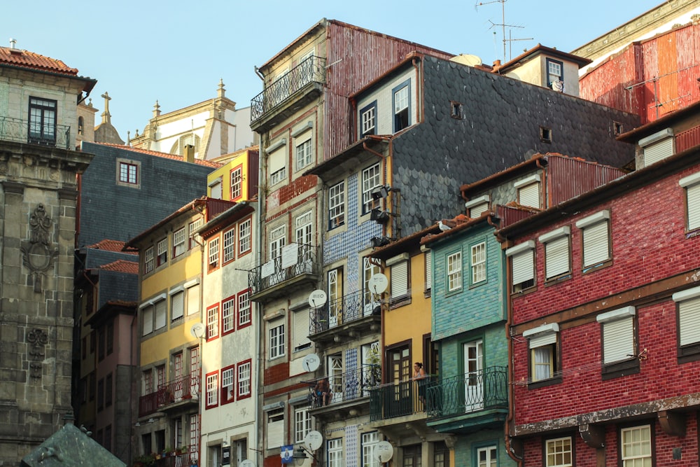 brown and green concrete buildings during daytime