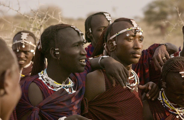 a group of people standing next to each other