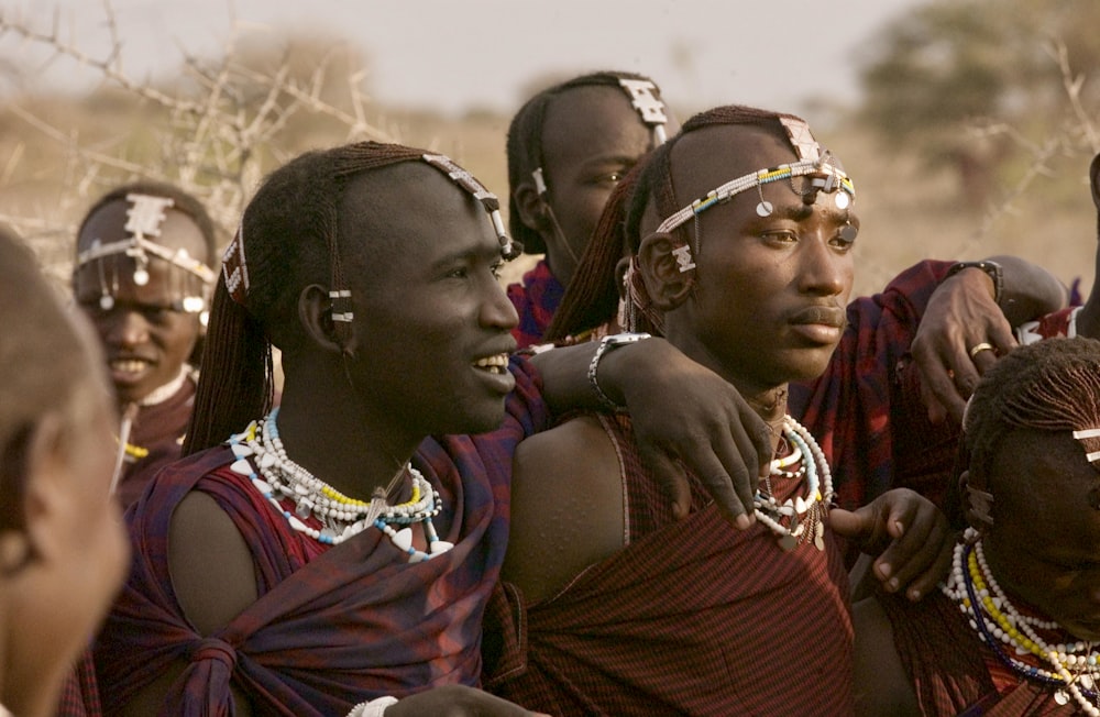 a group of people standing next to each other